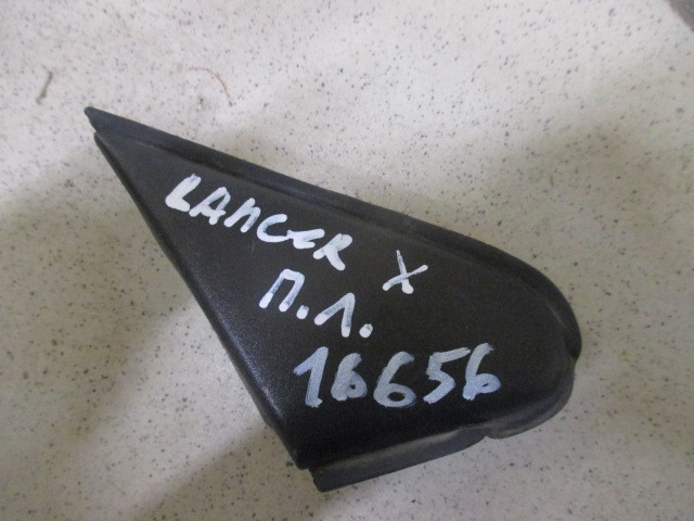 Накладка переднего крыла левого на Mitsubishi Lancer X