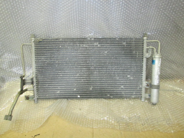 Радиатор кондиционера (конденсер) Mazda Demio I (DW) 1997-2003 на Mazda Demio I (DW)