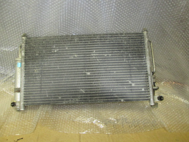 Радиатор кондиционера (конденсер) Mazda Demio I (DW) 1997-2003 на Mazda Demio I (DW)