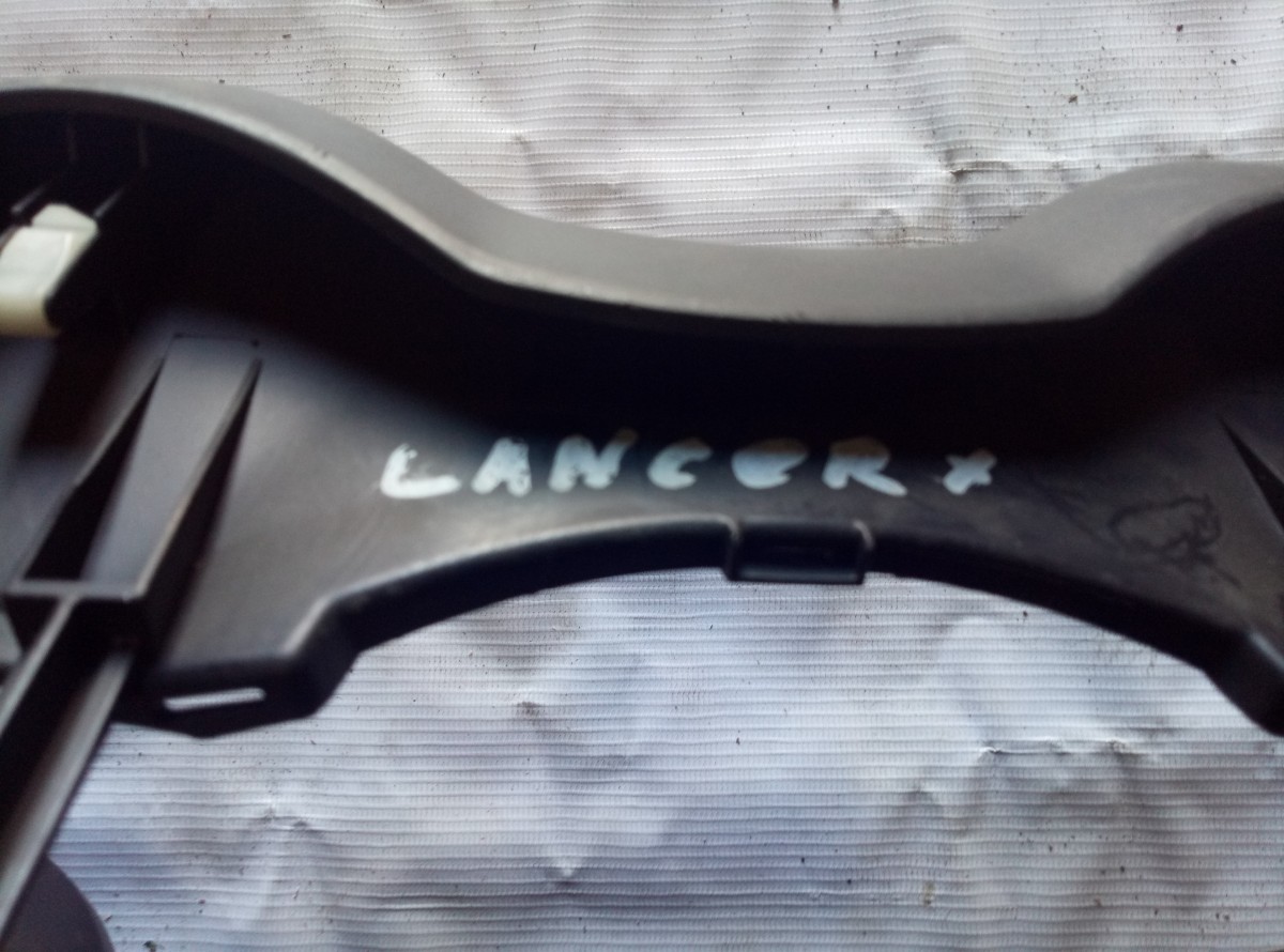 Обшивка салона Mitsubishi Lancer 10 2007-2015 8060A047ZZ  на Mitsubishi Lancer X
