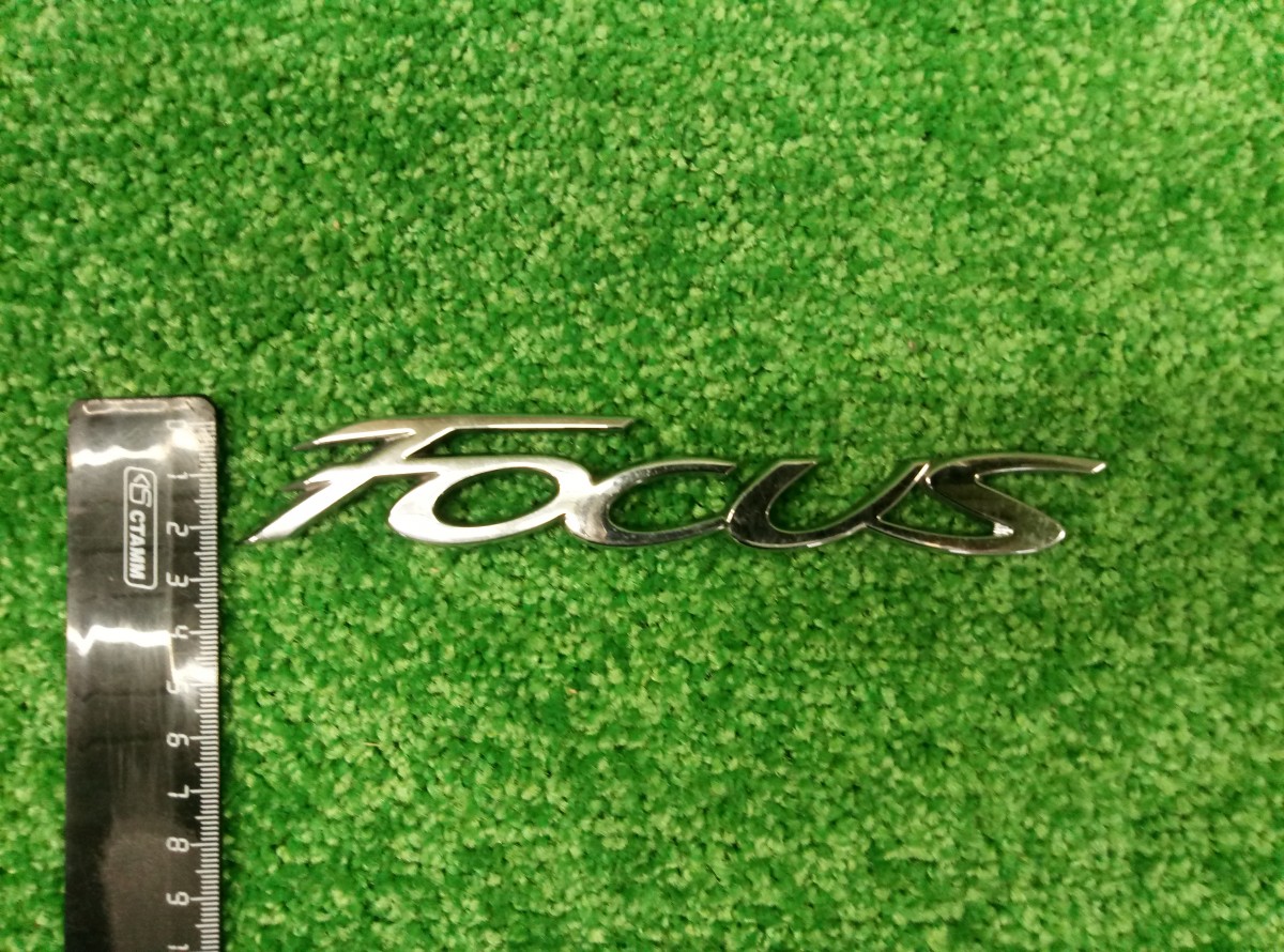 Эмблема на крышку багажника Ford Focus BM51R42528AA на Ford Focus 2