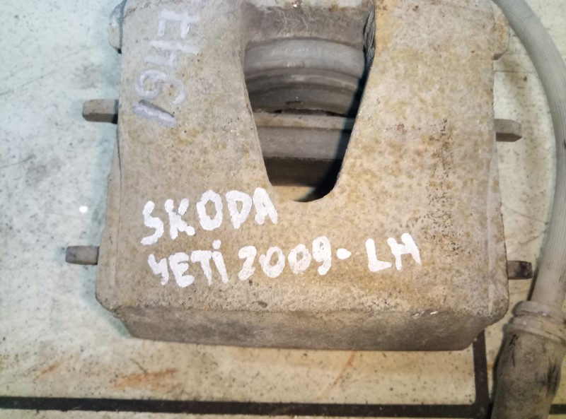 Суппорт передний левый Skoda Yeti  2009-2013 на Skoda Yeti 