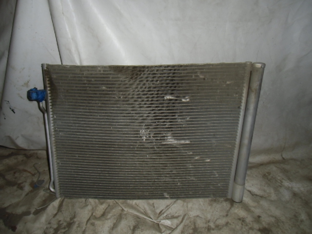 Радиатор кондиционера (конденсер) на BMW X5 E70